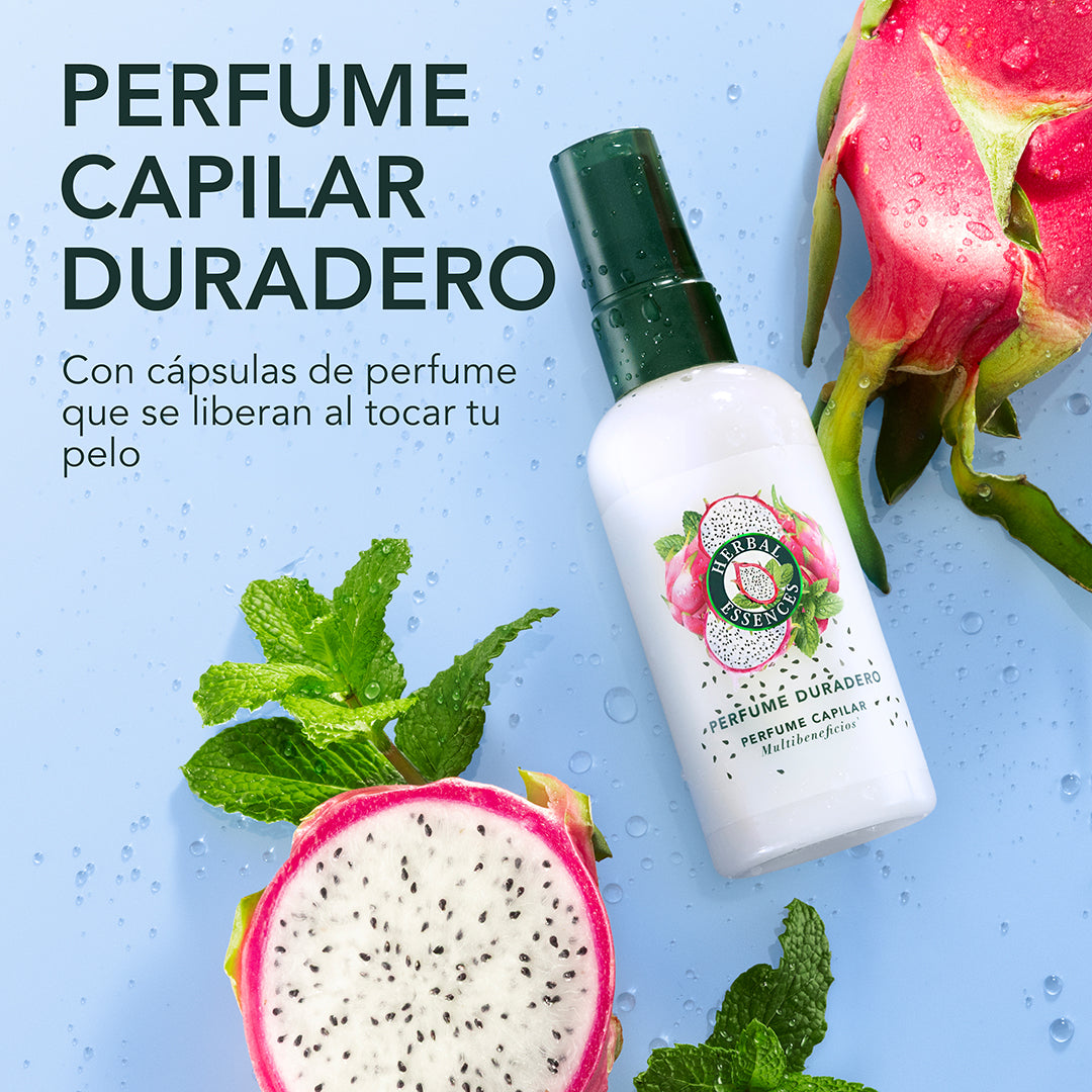 Perfume Capilar Duradero Herbal Essences Pitahaya y Menta rodeado de pitahayas cortadas y hojas de menta con texto Perfume Capilar Duradero con cápsulas de perfume que se liberan al tocar tu pelo