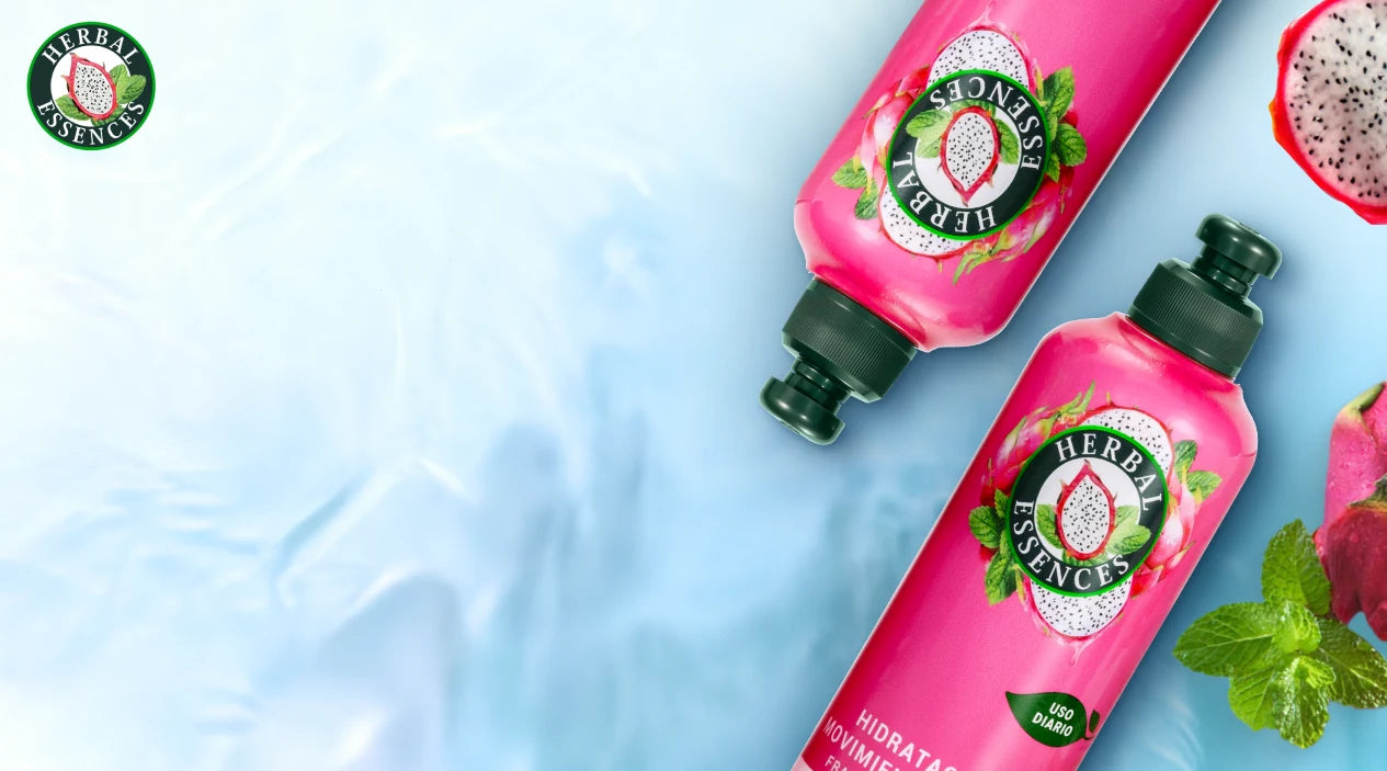Banner Crema para Peinar Herbal Essences Pitahaya y Menta con texto Reactiva Tu Perfume toca y mueve tu cabello para reactivar su fragancia durante el día